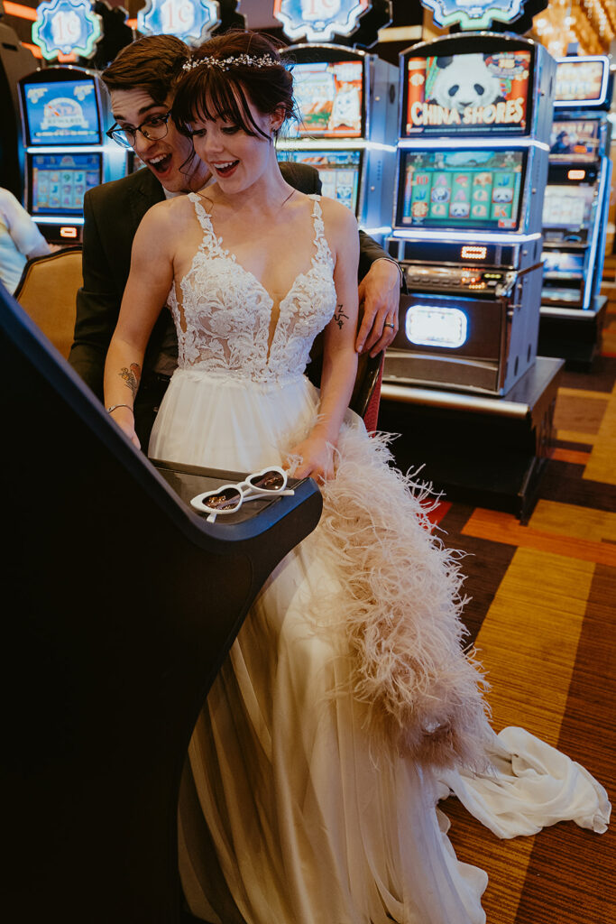 Las Vegas Wedding elopement couple announcement with a classic Vegas vibe at the slot machine.