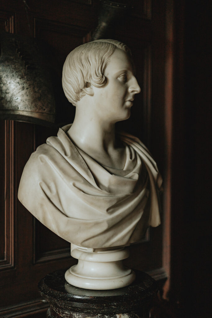 Statue in front entrance of castle leslie estate