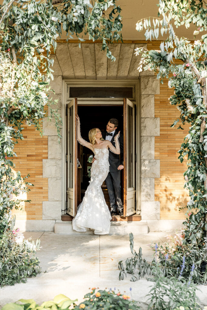 bride and groom looking at each other 