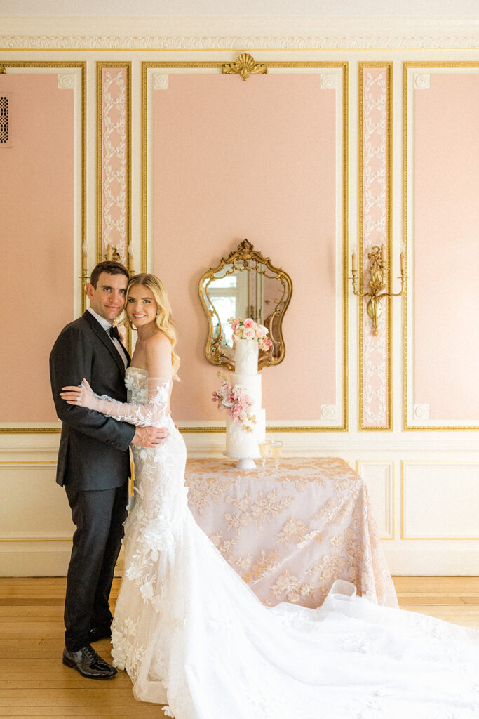 bride and groom posing for the camera