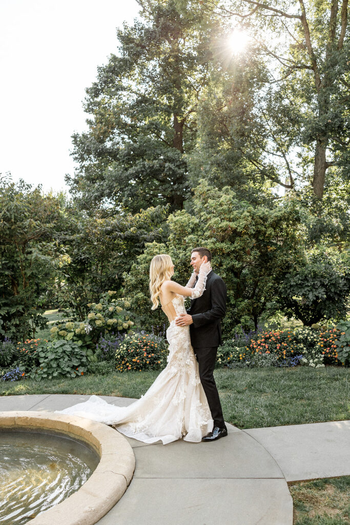 bride and groom hugging 