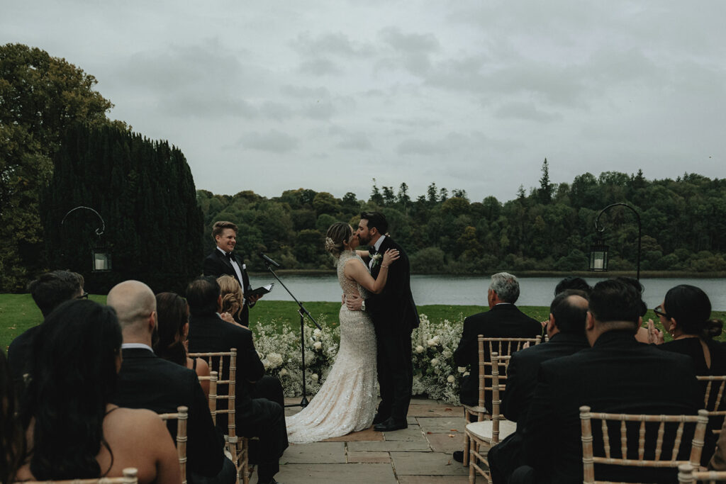 bride and groom kissing after their dream wedding ceremony