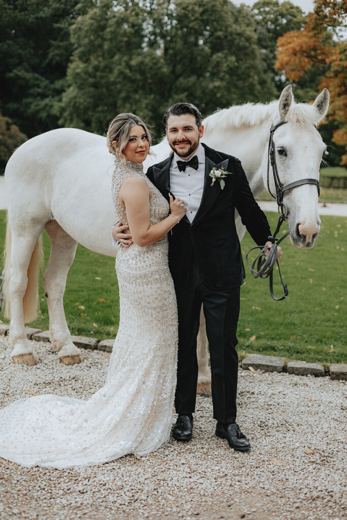 couple looking at the camera during their bridal portraits 