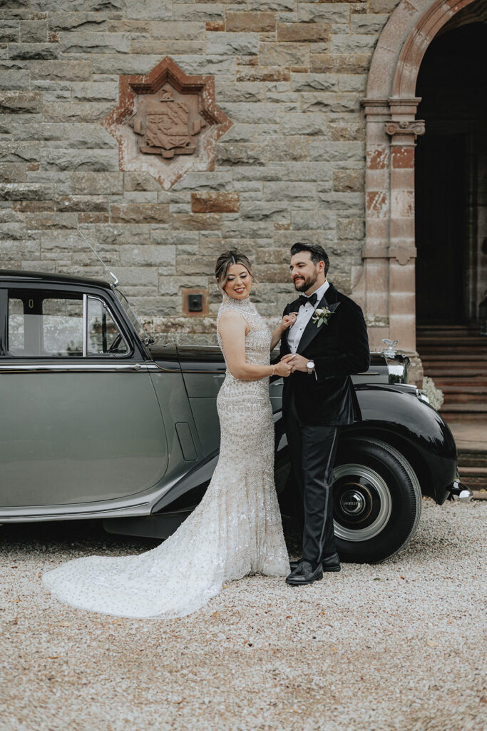 bride and groom holding hands