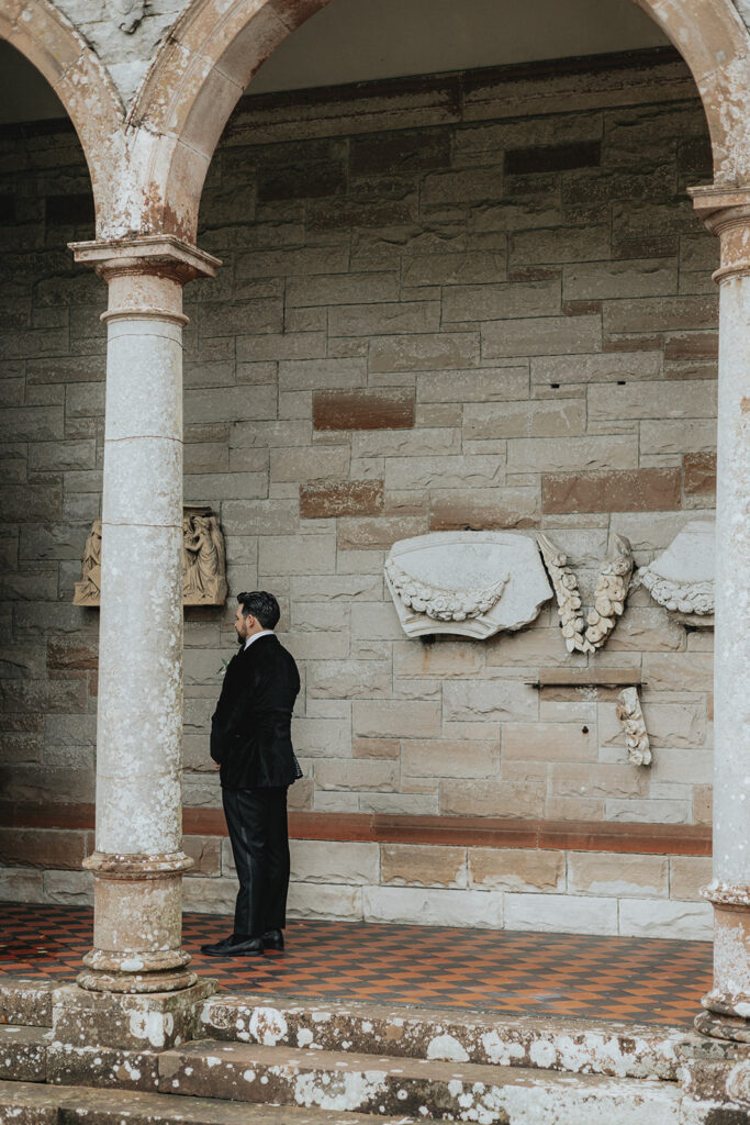 groom at his first look with the bride