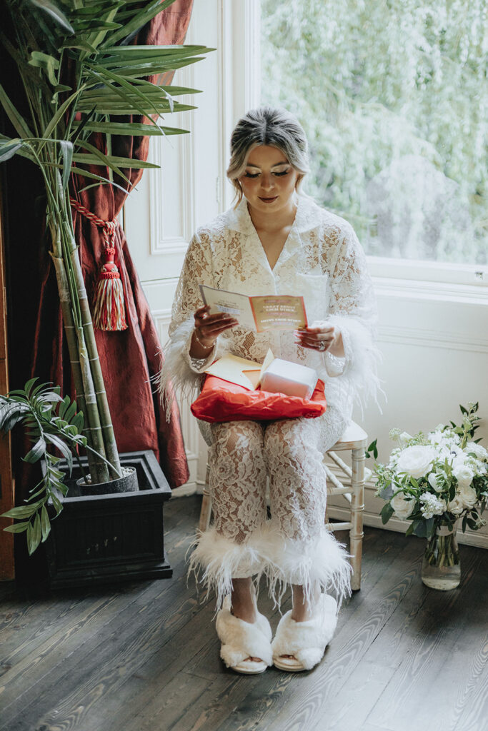 bride opening her wedding gift 