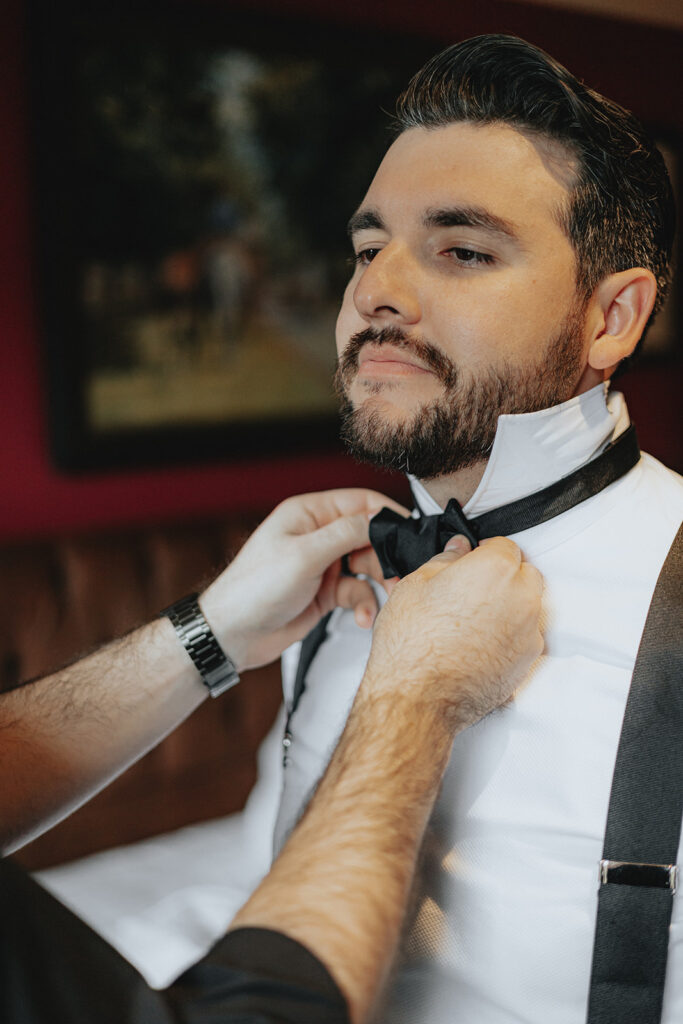 groom getting ready for his wedding ceremony 