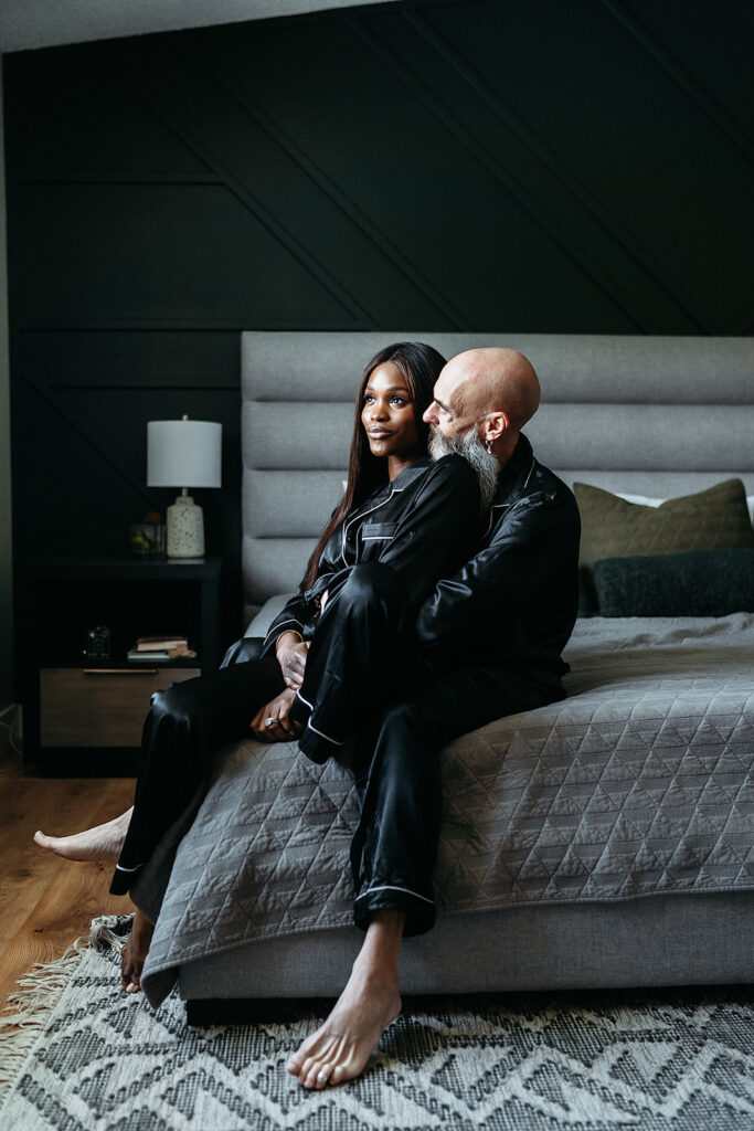 cute couple at their engagement session in their airbnb