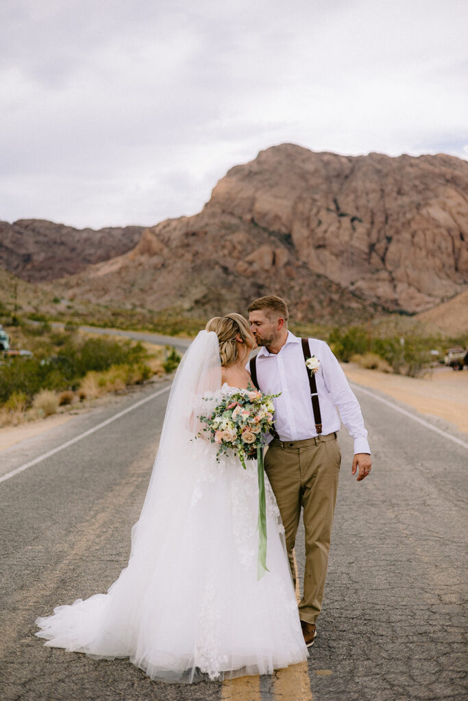 newly married couple kissing -Planning A Stress Free Wedding