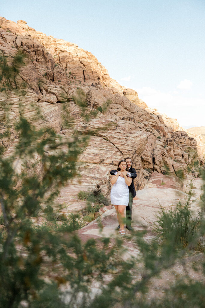 Engagement Photo Locations in Las Vegas: couple hugging during their dream engagement session