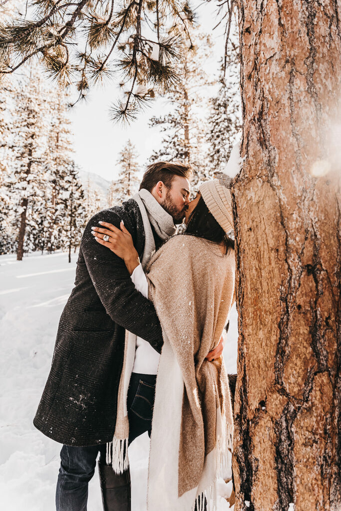 cute couple kissing during their engagement session