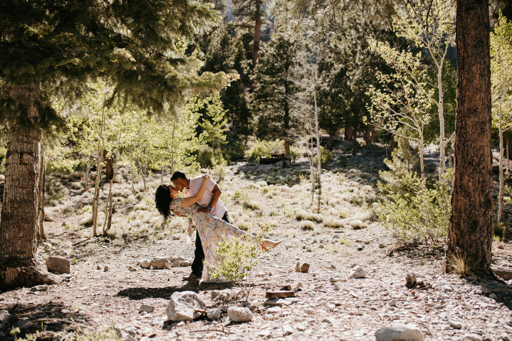 couple kissing during their summer engagement session