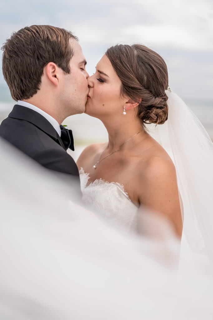 picture of the bride and groom kissing