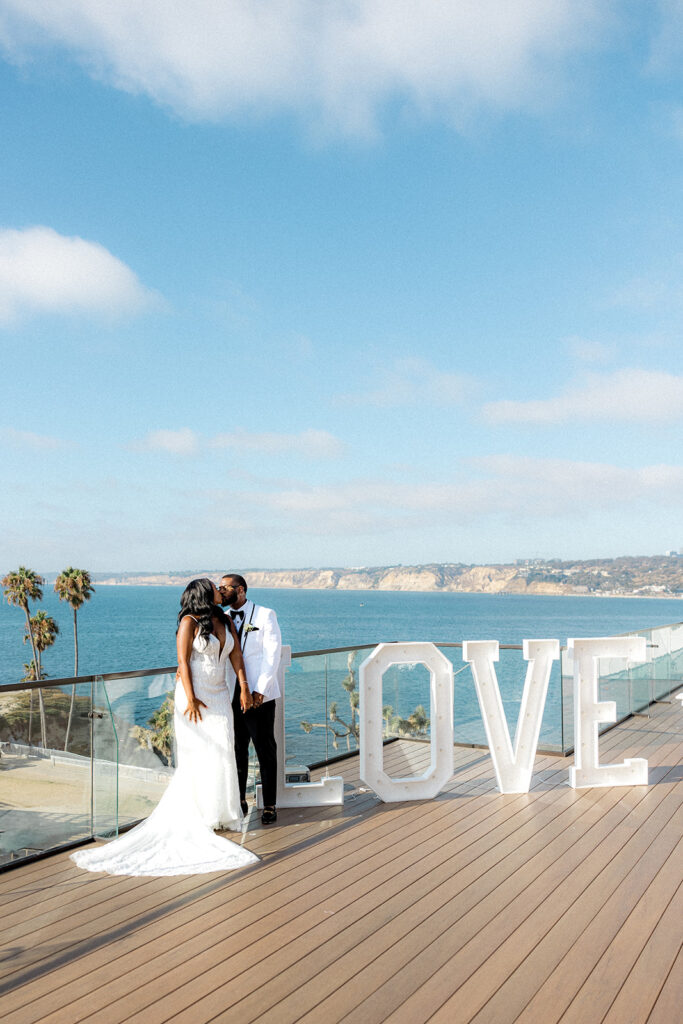 cute couple at their dream coastal wedding in san diego