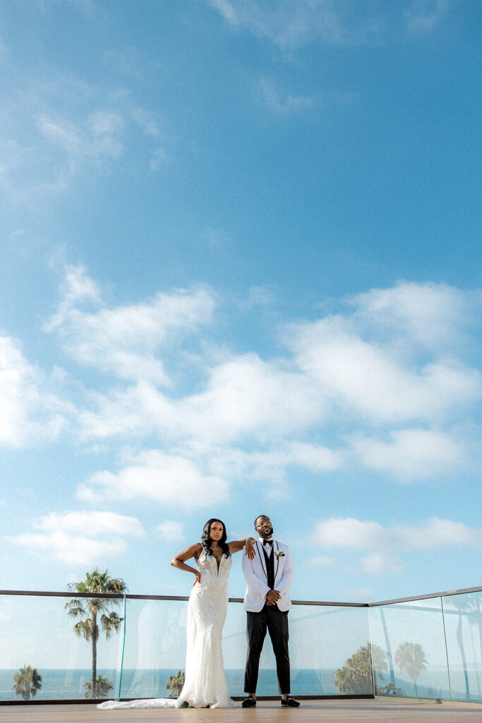 cute couple looking at the camera during their bridal portraits