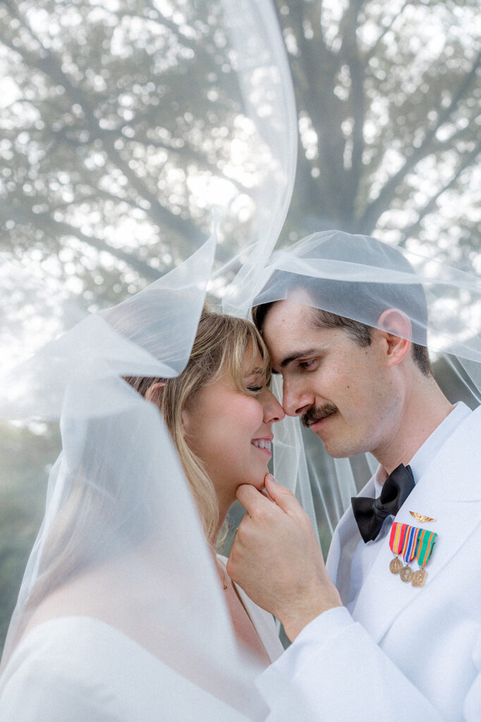 cute portrait of the bride and groom looking at each other