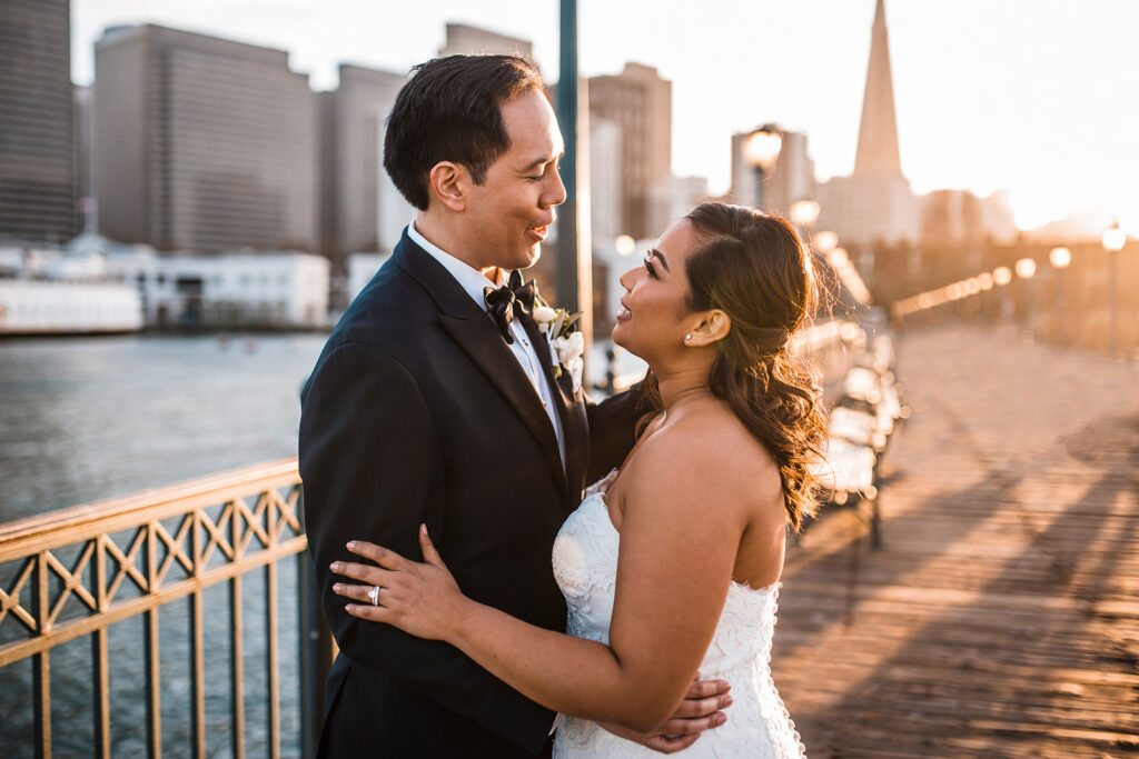 bride and groom looking at each other 