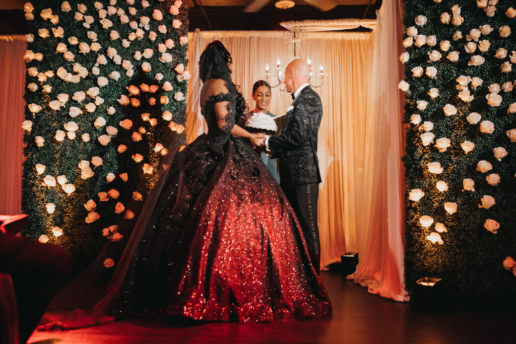 bride and groom holding hands at their ceremony