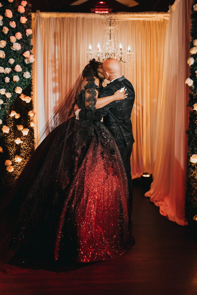 bride and groom kissing after their wedding ceremony 