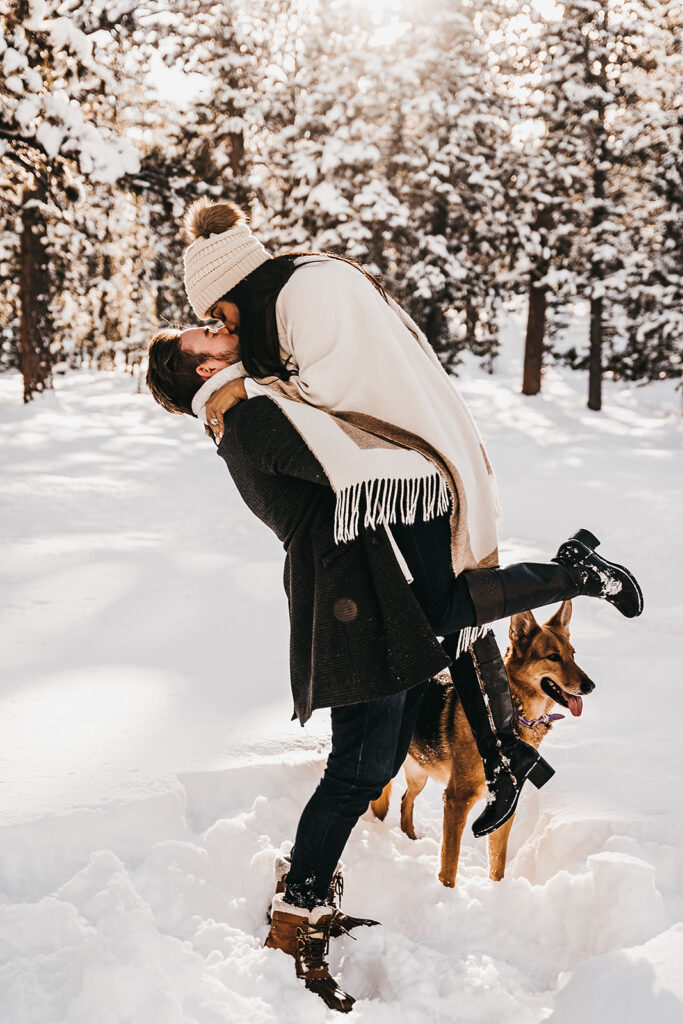 portrait of the newly engaged couple kissing 