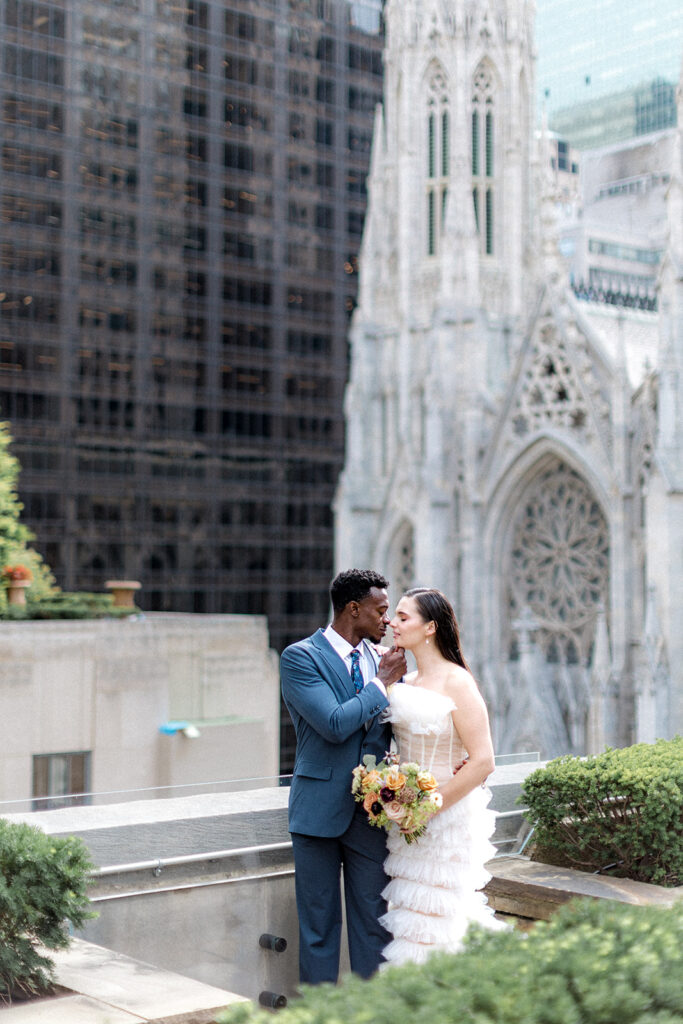 groom kissing the bride on the cheek