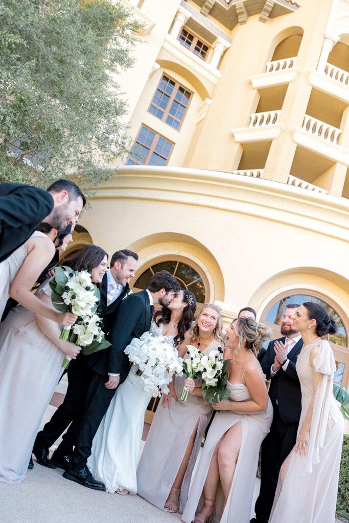 portrait of the newlyweds kissing