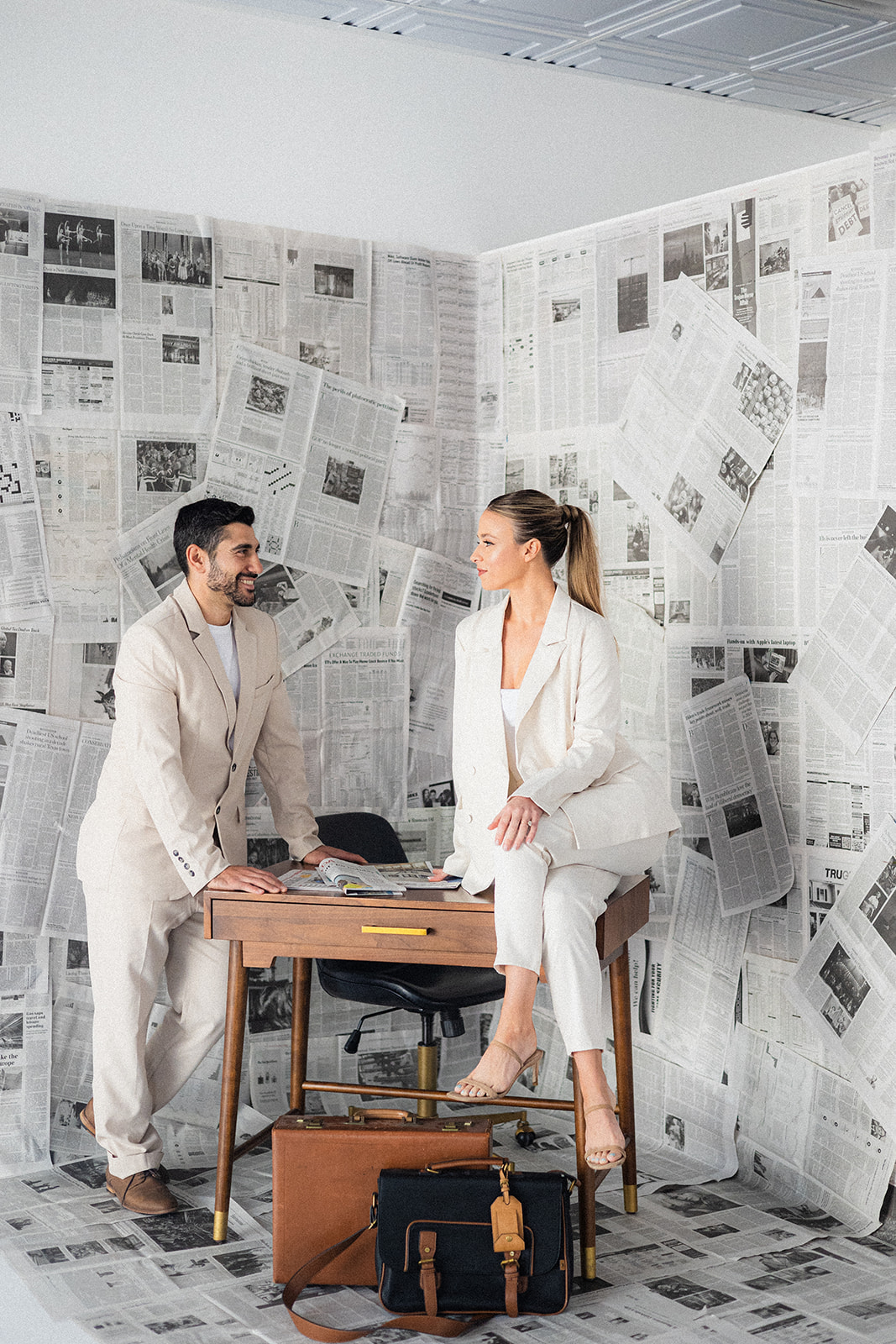 cute couple looking at each other during their new england engagement session photoshoot by boston wedding photographer