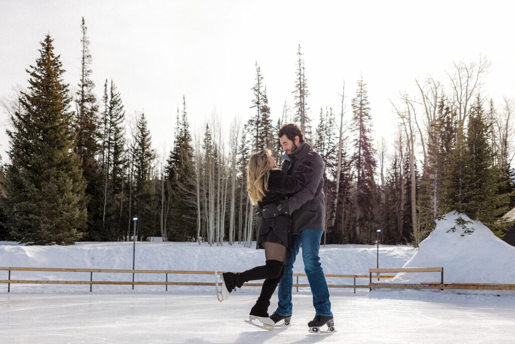 cute couple looking at each other during their winter couple session