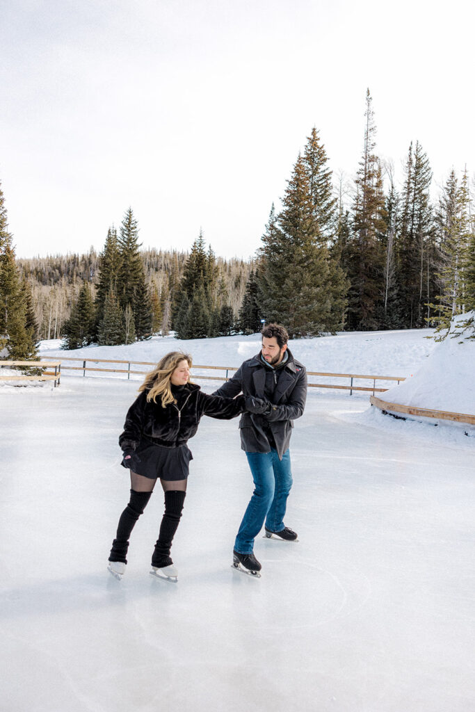 cute couple ice skating during their couple session