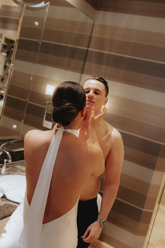 bride and groom getting ready for their ceremony
