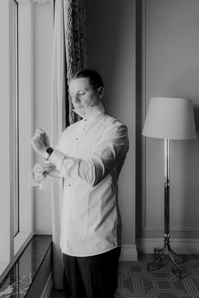 groom getting ready for his wedding ceremony