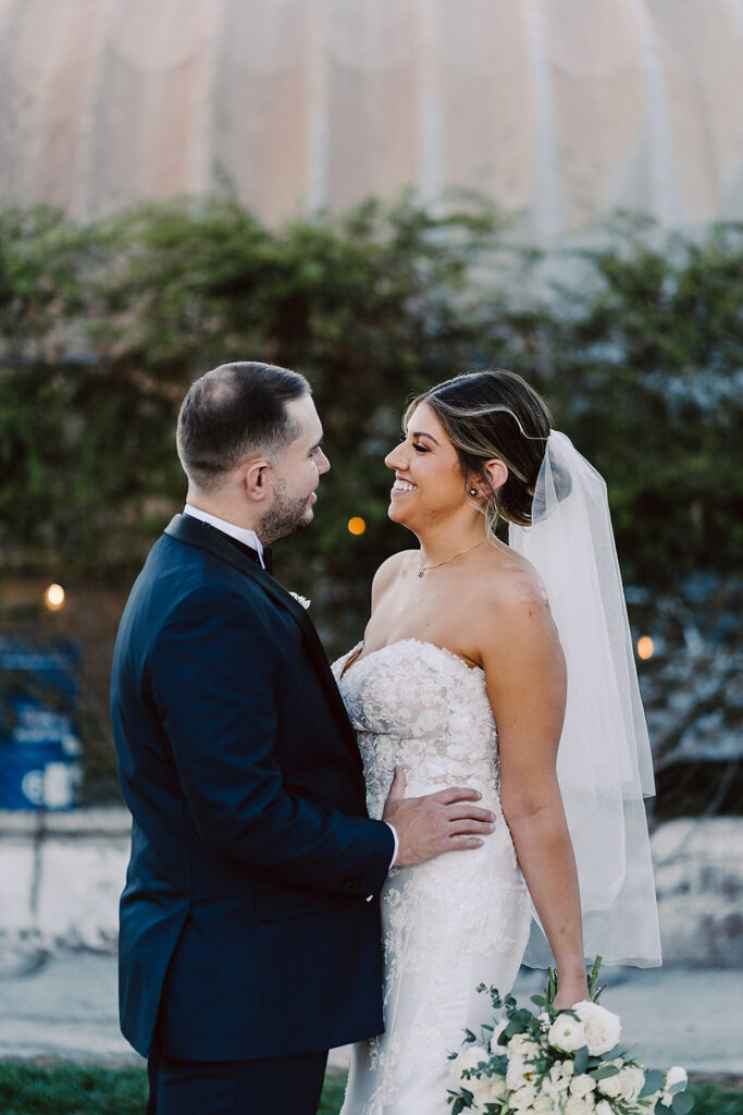 picture of the newlyweds laughing with each other