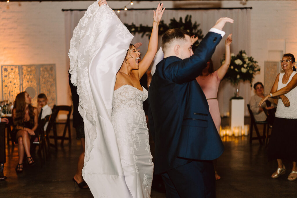 newly married couple dancing at their reception