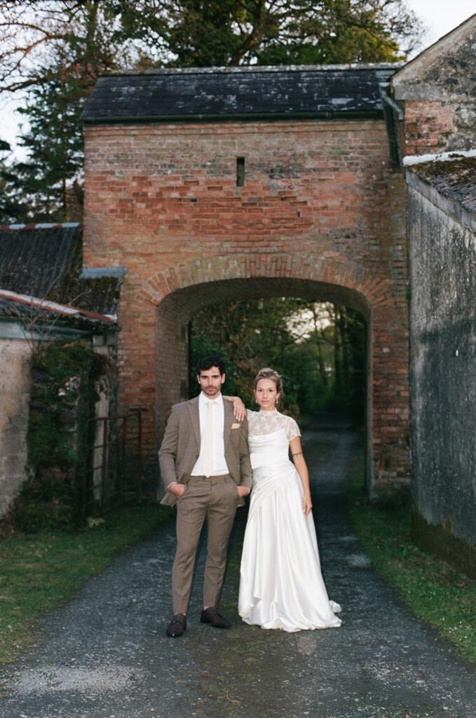 picture of the bride and groom posing for the camera during their bridal portraits
