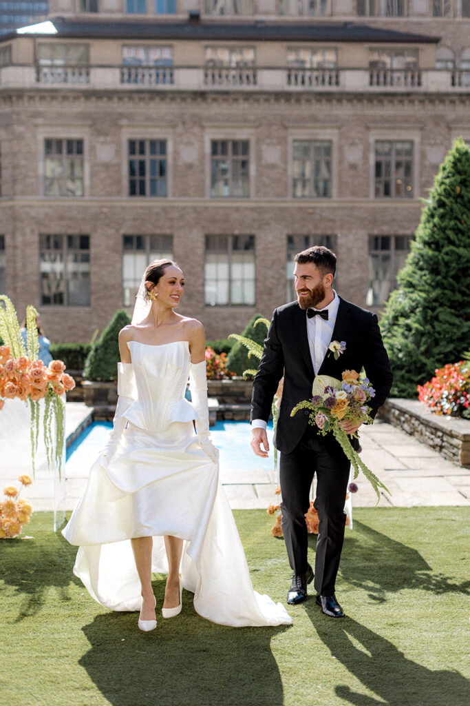 happy newly married couple at their fun photoshoot