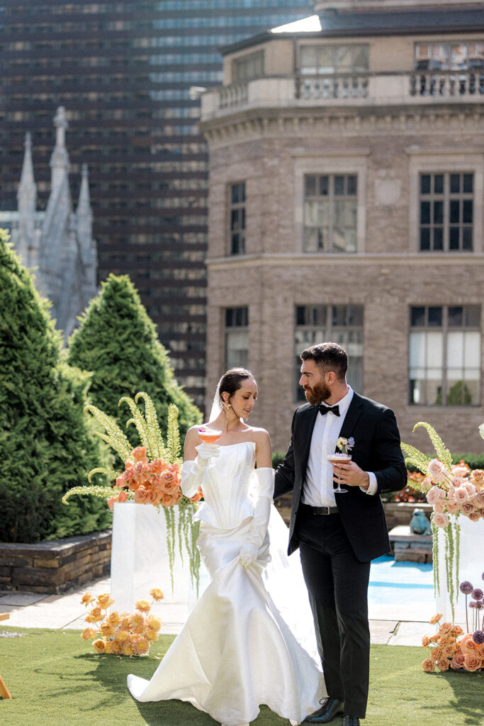couple celebrating their wedding with champagne 