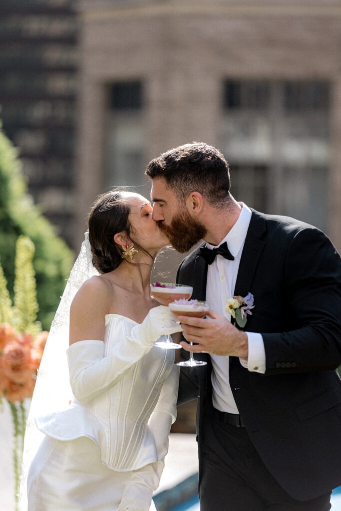 cute portrait of the newlyweds kissing